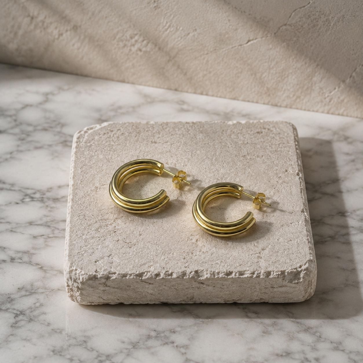 Sculpted Triple Hoop Earrings – Minimalist Gold-Tone Statement Jewelry