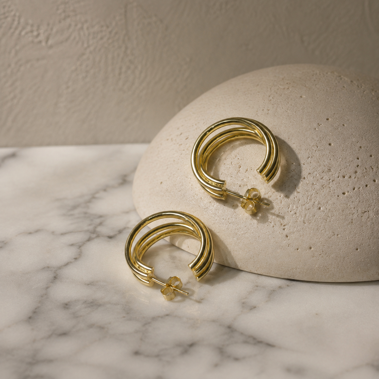 Sculpted Triple Hoop Earrings – Minimalist Gold-Tone Statement Jewelry