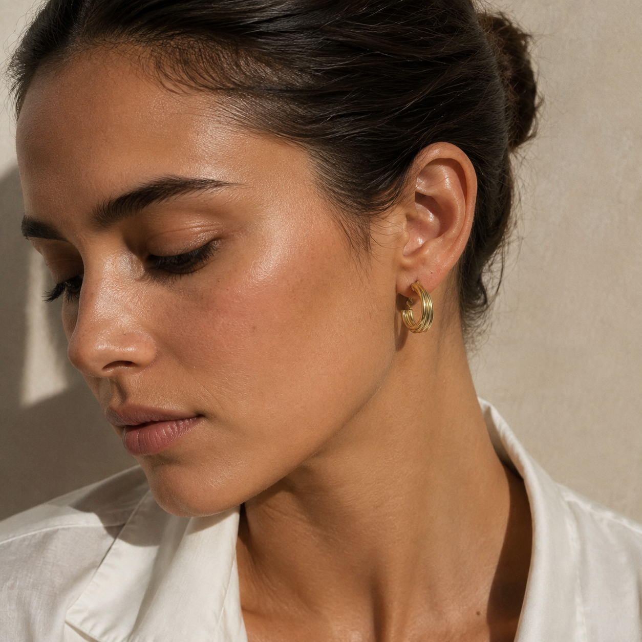 Sculpted Triple Hoop Earrings – Minimalist Gold-Tone Statement Jewelry
