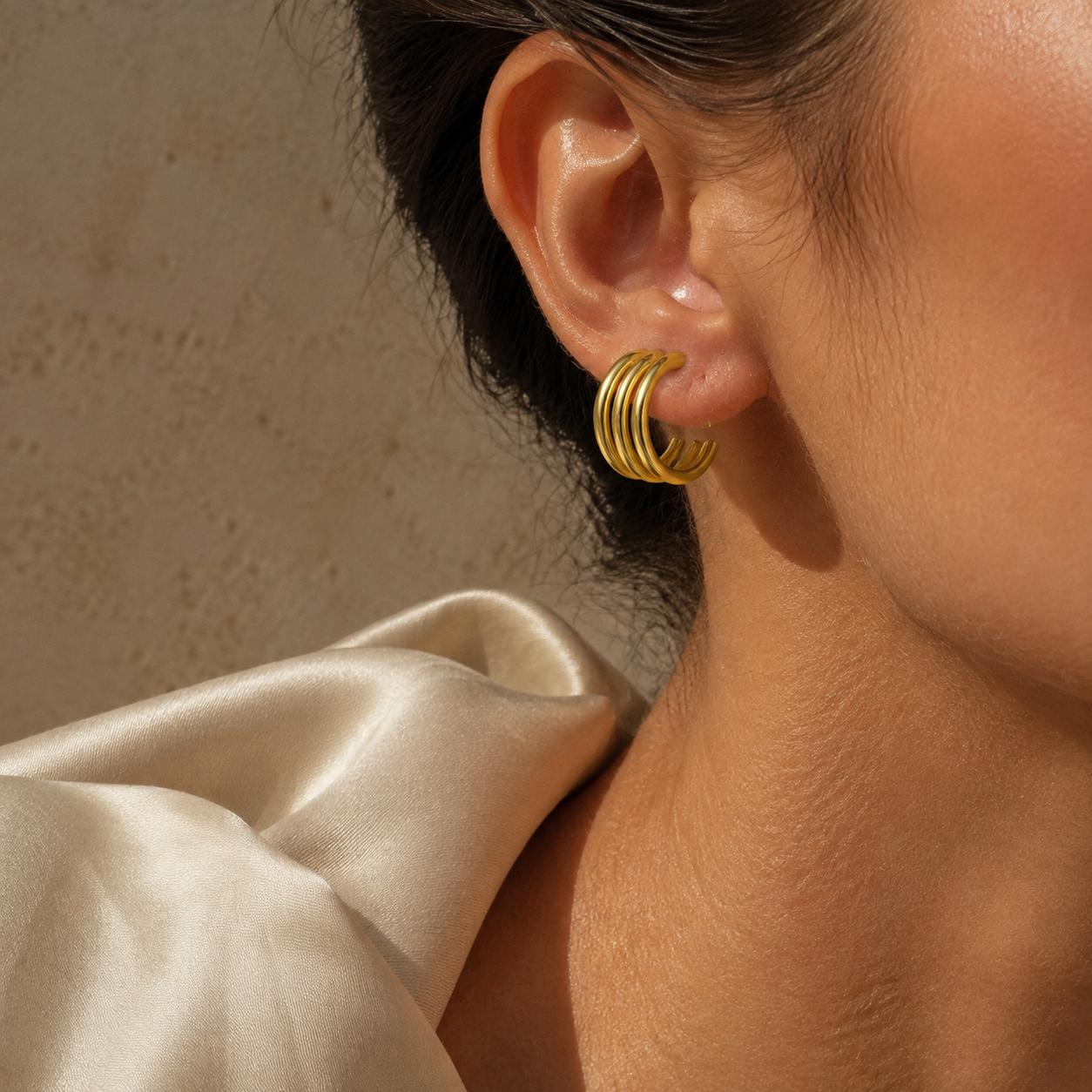 Sculpted Triple Hoop Earrings – Minimalist Gold-Tone Statement Jewelry